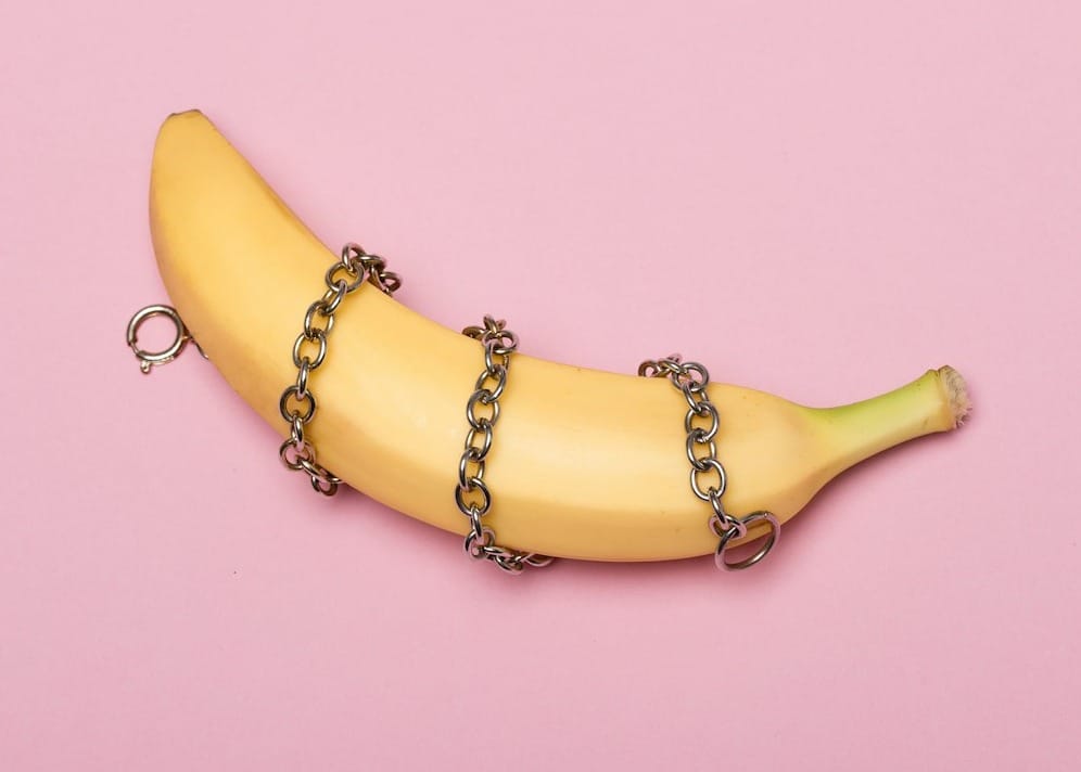 yellow banana on white surface